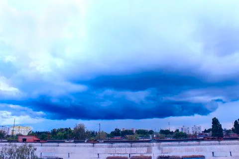 Storm-cloud above the city Stock Photos