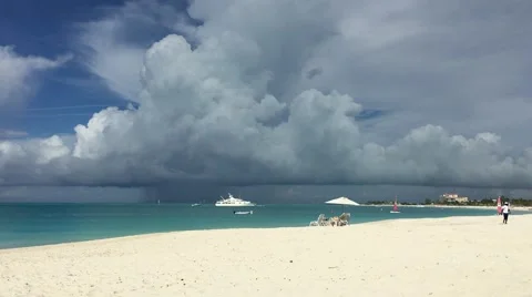 Storm Cloud and Rain with Yacht in Grace Bay Stock Footage