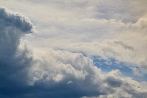 Storm cloud approaching in the sky, approaching rain, weather change Stock Photos