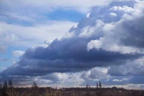 Storm cloud front low overhead Stock Photos