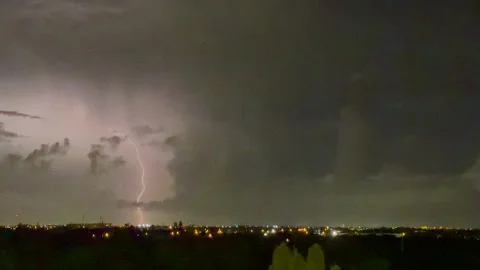 Storm Cloud Illuminated From Within by a Bright Lightning Flash at Dusk, 4K Stock Footage 342204528