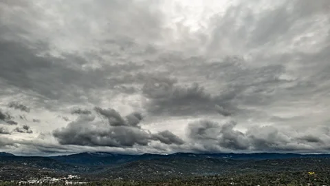 Storm Cloud Layers Criss Cross Sky in Sierra Nevada Mountains Stock Footage 283013312