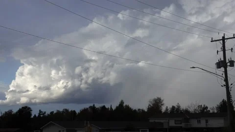Storm cloud moves toward city under severe weather warning Stock Footage 141305619