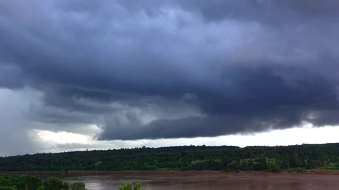 Storm cloud over Mekhong river time lapse shot Stock Footage 79388375