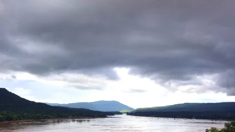 Storm cloud over Mekhong river time lapse shot Stock Footage 79389017