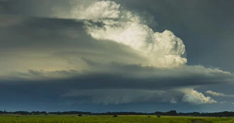 Storm cloud rising in the sky, a powerfull updraft, supercell cloud Stock Footage 145145941