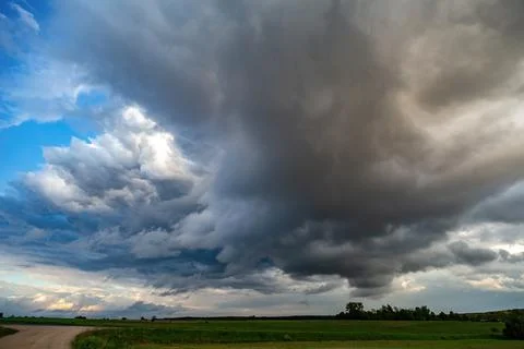 Storm cloud scene warning. Face shape, eyes, nose Stock Photos