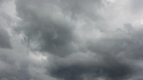 The storm cloud very quickly moves on the gray sky. Stock Footage 62513885