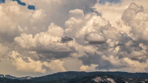 Storm Clouds above Forest and Granite Cliffs and Peaks Time Lapse Stock Footage 280020937