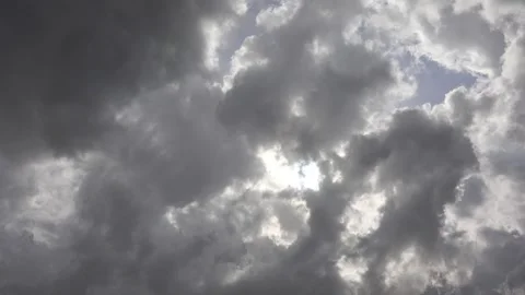 Storm clouds above green hills rain curtains - Dramatic Sky and Weather Pattern Stock Footage 339565576