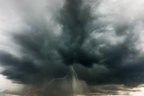 Storm clouds and lightning Stock Photos