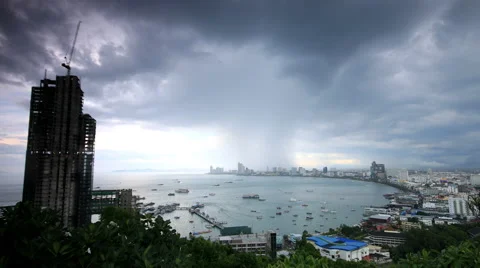 Storm clouds and rain over Pattaya city Thailand, time lapse 4k 4096x2304. Stock Footage 43249829