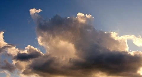 Storm clouds and sun Stock Photos