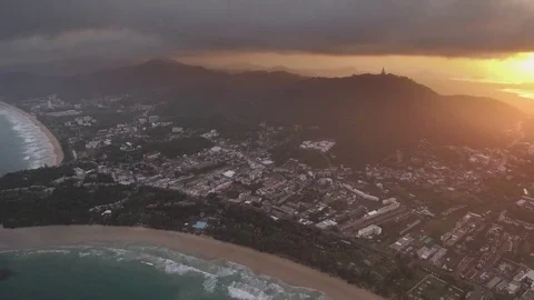 Storm Clouds And Sunrise Over Karon And Kata, Phuket, Thailand, High Aerial Pan Stock Footage 80325696