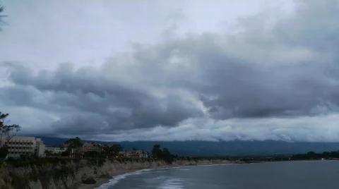 Storm clouds approaching coastline time lapse Stock Footage 634381