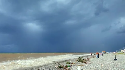 Storm clouds approaching in wide view over Batumi beach Stock Footage 345361675