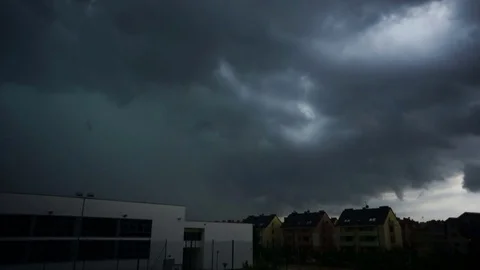 Storm clouds are running over the city. The weather is getting worse. Overcast Stock Footage 78300505