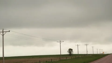 Storm Clouds in Background of Electrical Poles and Lines Stock Footage 50645880