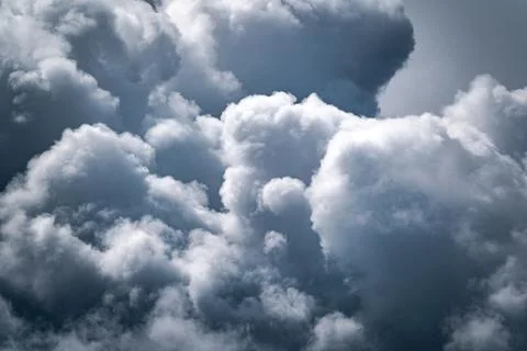 Storm clouds background sky with white voluminous foamy air magic clouds in a Stock Photos