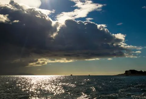 Storm clouds on the bay Stock Photos