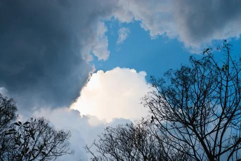 Storm clouds on blue sky Stock Photos