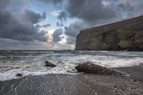 Storm clouds breaking up at Crackington Haven Cornwall Foto stock