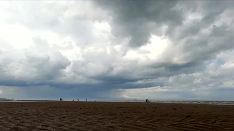 Storm clouds carrying rain above Portobello Beach Edinburgh Scotland UK Stock Footage 133711797