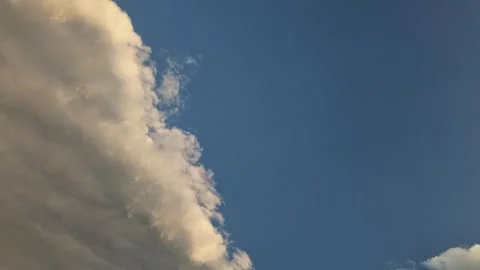 Storm clouds clearing blue sky timelapse Stock Footage 338238638