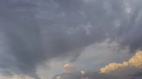 Storm clouds closing in on blue sky Stock Footage 53239908