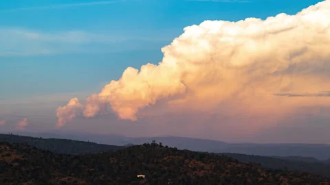 Storm Clouds Collapse into Pink Sunset Stock Footage 283516748
