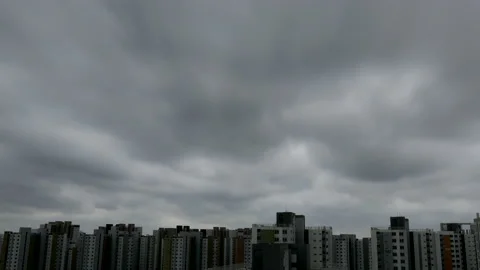 Storm clouds coming above high-rise buildings Stock Footage 155869518