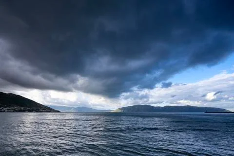 Storm clouds coming upon the peninsula. Stock Photos
