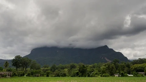 Storm clouds cover the mountain Video stock 77478432