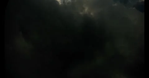 Storm Clouds Crossing In Front of Sun Stock Footage 339916207