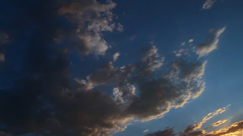Storm clouds disperse at sunset Stock Footage 30301902