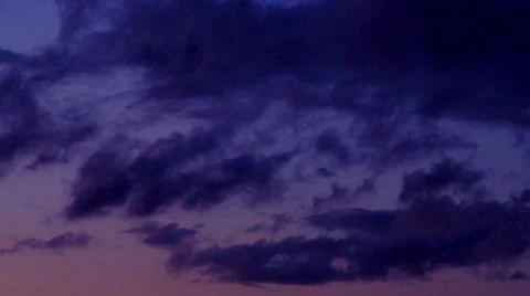 Storm clouds drifting across evening sky Stock Footage 41534448