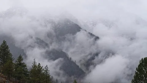 Storm Clouds Engulf Mountain Peak Stock Footage 319965917