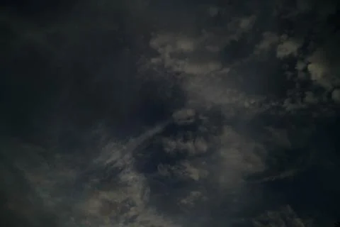 Storm clouds in the evening sky background. Stock Photos