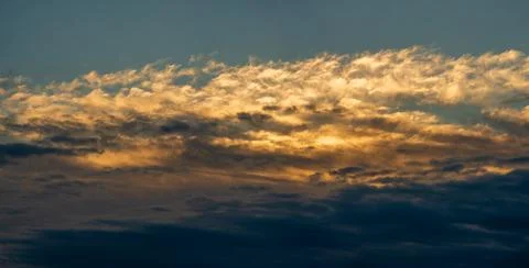 Storm clouds in the evening sky Stock Photos