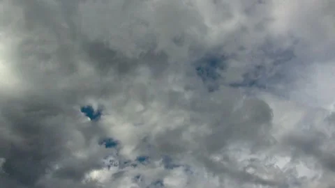 Storm clouds forming under blue sky, in time lapse clip. Stock Footage 273517687