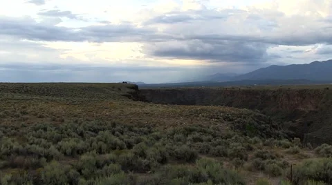Storm clouds gather above the Rio Grande near Taos, NM. Stock Footage 58061607