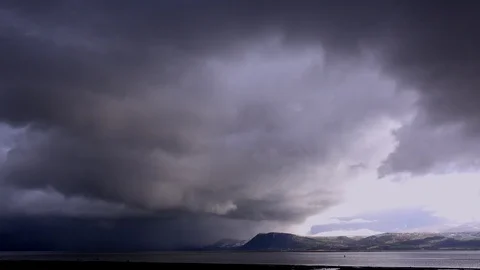 Storm clouds gather over the coast bad weather UK 4K 스톡 동영상 102626825