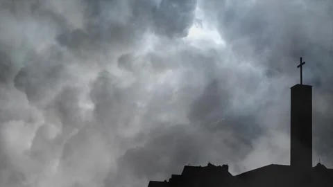 Storm Clouds Gather Over the Cross of Redemption Stock Footage 338158926