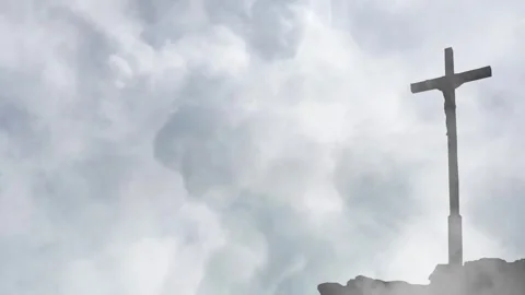 Storm Clouds Gather Over the Cross of Redemption Stock Footage 338158942