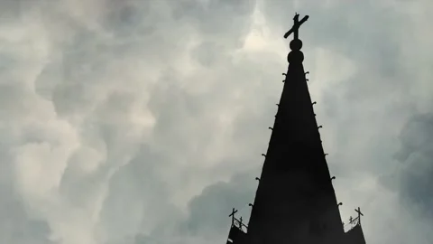 Storm Clouds Gather Over the Cross of Redemption Stock Footage 338432244