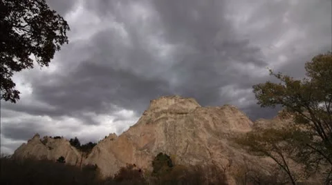 Storm Clouds Gather over White Rock in the Garden of the Gods Timelapse Vídeo Stock 8965850