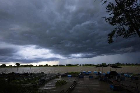 Storm Clouds Gathering Over Chao Phraya River In Chai Nat 写真素材