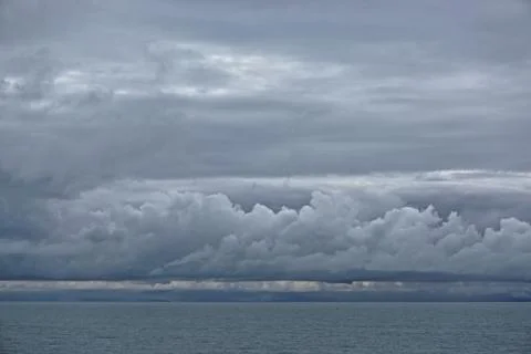 Storm clouds gathering over the deep blue waters of the Gulf of Alaska. Foto stock