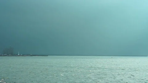 Storm clouds gathering over Lake Erie. Video stock 126087236