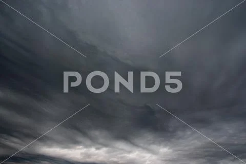 Storm clouds as if armageddon. Rainy clouds over horizon. Stock Photos
